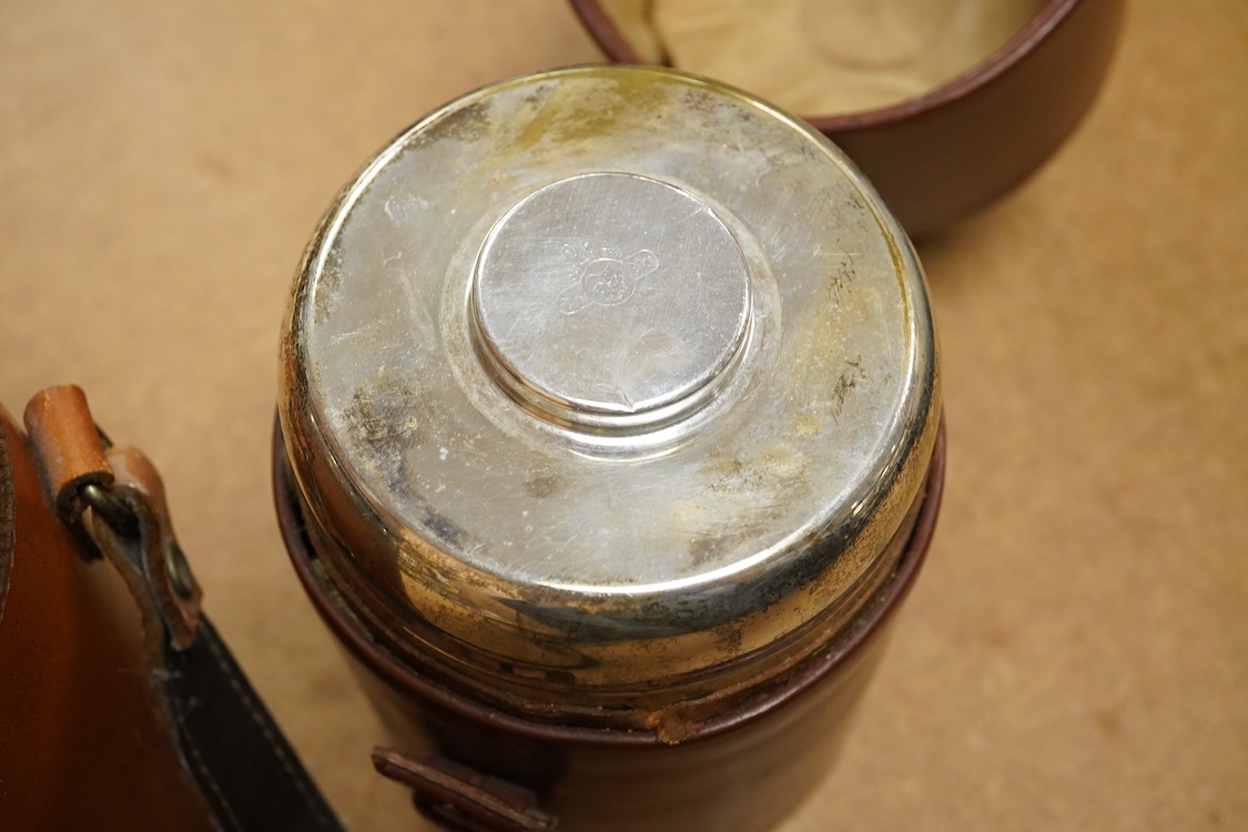 Two silver plate mounted flasks in cases to include a three sectioned example, largest 19cm high